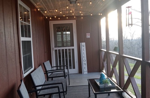 Marshall House | Secluded Magnolia Cabin & Hot Tub