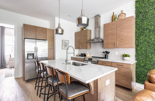 Katie Hill Neighborhood House | Skyline Serenity – Rooftop Patio – Ping Pong