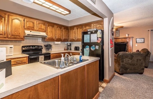 Holiday Island Condo | Sleep 11 comfortably, summer calendar booking fast! Walk to lake & marina!