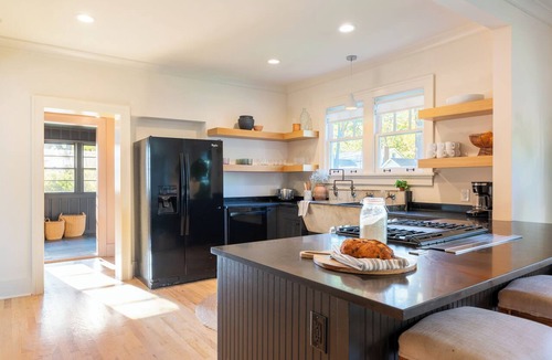 Eastwood House | Southern Charm, Backyard Firepit, Mins to Downtown | Chapel House by AvantStay