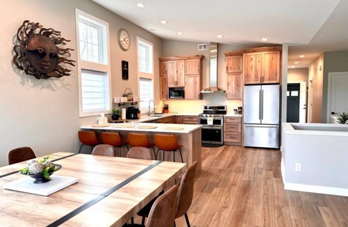 Riverside House | Stunning Sunrise Home | Waterfront | Sauna | Views | Dogs | Trail Access