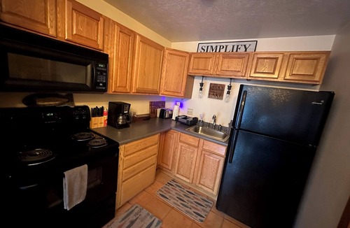 Sylvan Shores Cabin | Terrace - lakefront, hot tub, full kitchen, BBQ, screened in porch, two patios.