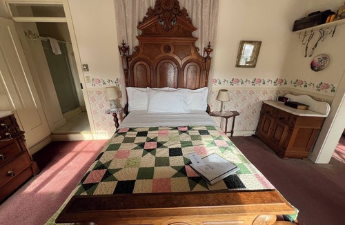Bentonsport Bed & Breakfast | The Mason Suite – A Grand Historic Guest Room with Timeless Character