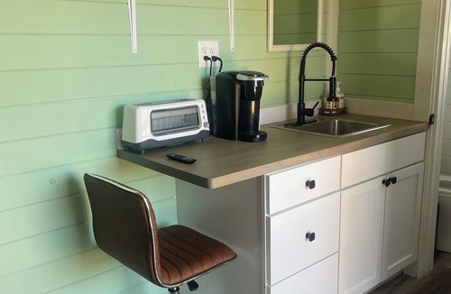 Tellico Plains Cabin | This unique tiny home has its own private pickleball court!