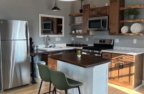 La Farge Apartment | Unwind at De Jean Loft above Kickapoo Hardware in downtown La Farge!