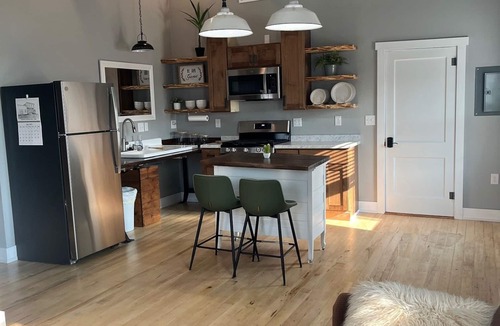 La Farge Apartment | Unwind at De Jean Loft above Kickapoo Hardware in downtown La Farge!