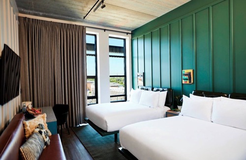 East Nashville Hotel | Unwind in Artist-Infused Room Near Popular Nashville Sights | 3 Rooms