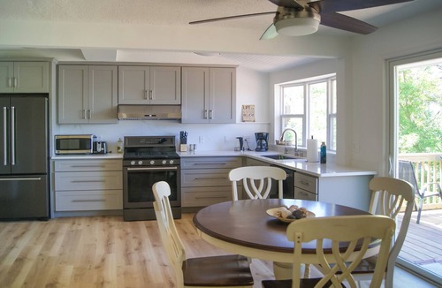 Maple Grove Cottage | Waterfront Eagle Lake Home w/Yard & Deck
