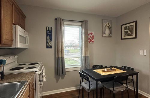 Overland Park House | Welcoming family feel enjoy a full kitchen, washer and dryer, and a pet friendly