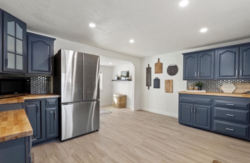 Village of Pewaukee House | Well Appointed Home Steps from Pewaukee Lake