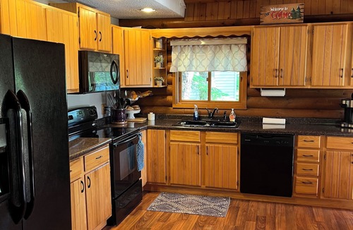 Merrill House | Wisconsin River Getaway. Large yard and shoreline. Pet friendly.