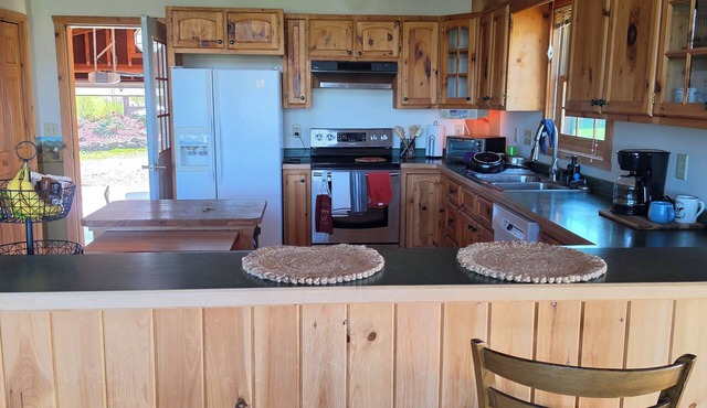 4 bedroom house in Chetek with AC and fitness room, horse stable upon request