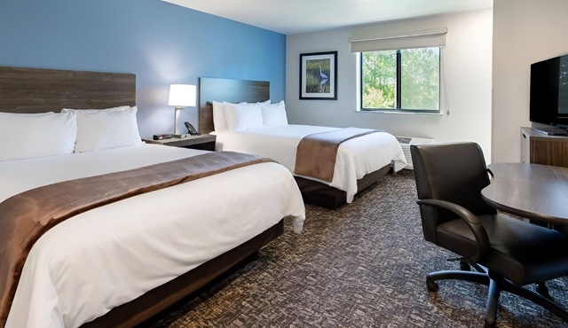 Affordable Extended-Stay Room with Full Kitchen and Outdoor Grilling Pavilion