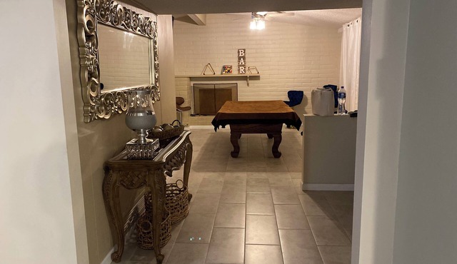 Charming 4-bedroom house with AC, WiFi, and play areas in pleasant Tucson