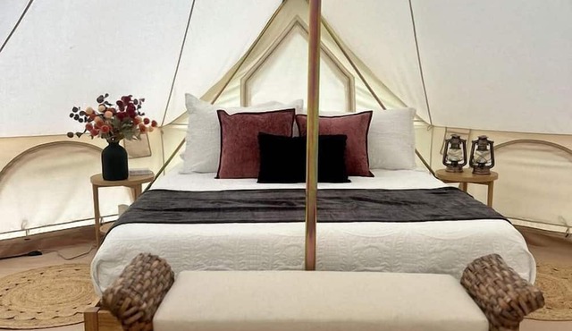 Enchanting Mountain Glamping Tents with Elevated Decks and Fire Pit Near Gentry, AR