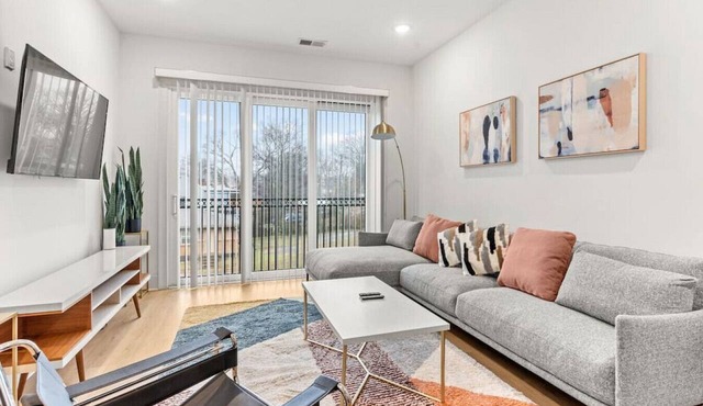 Modern Spacious Condo with Parking by Downtown Broadway