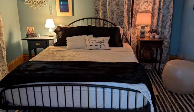 Skyline Suite for 4+ with Private Balcony & Large Shared Fenced Yard
