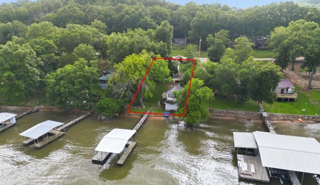Visit this 4 Bedroom - 3 Bath Lakefront Home with Private Dock