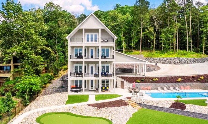Hot Springs House | Luxe 8BR Lakefront Home, Private Pool, Hot Tub, Gameroom, Putting Green, Firepit