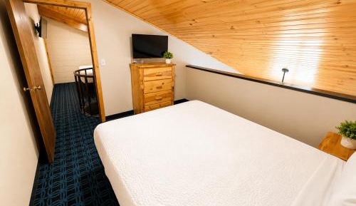 Family Suite with One King Bedroom,  One Queen Bedroom and One Double Bedroom